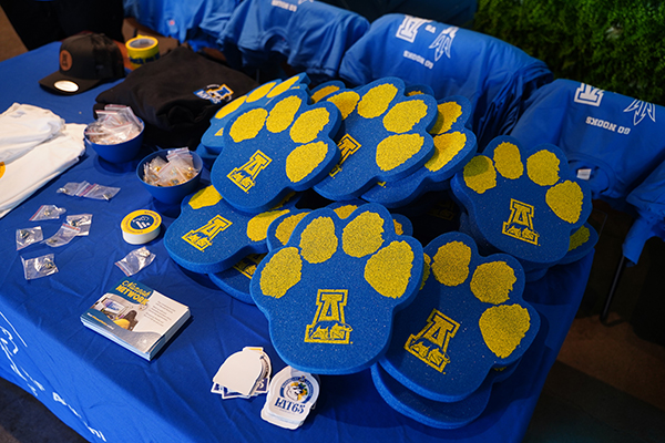 A variety of blue and gold gear was ready for the 无码乱伦 alumni and supporters who gathered in Arizona in February 2024 to see the Alaska Nanooks take on the Arizona State University Sun Devils. Photo by Shayna Goldberg.